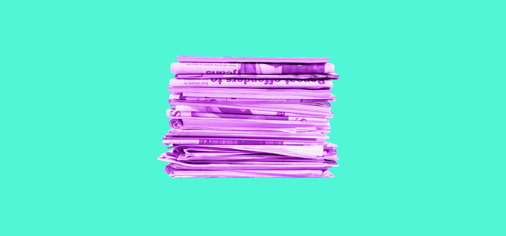 stack of newspapers on green background