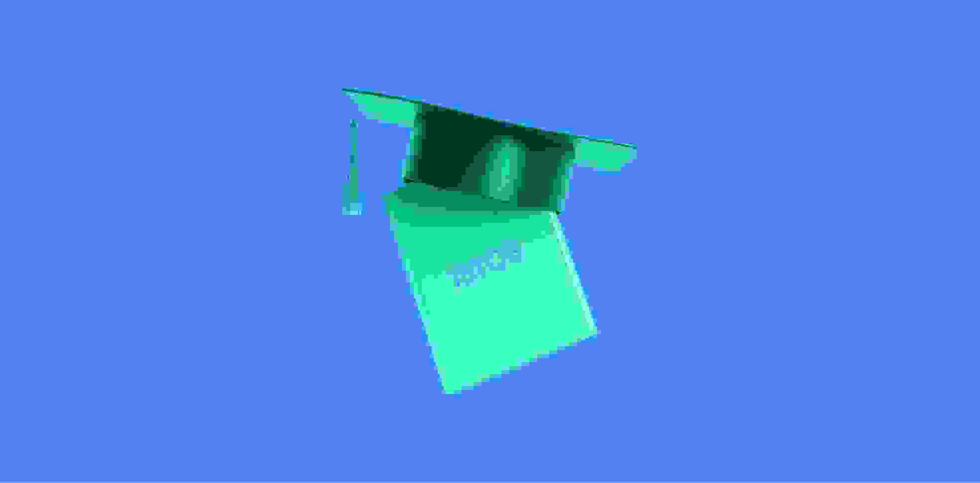 notebook and professor's hat on a blue background