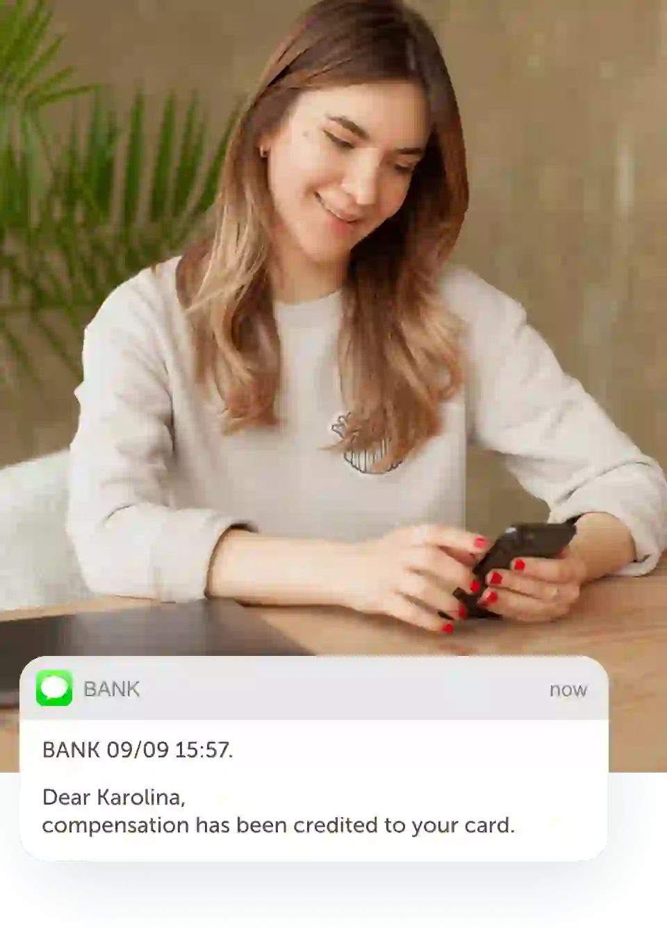A message from a bank that pops up on the smartphone reading that compensation has been credited to the card
