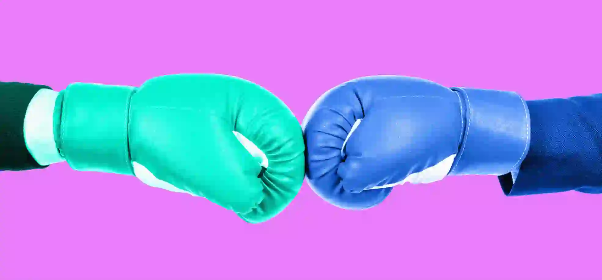 green boxing glove against blue boxing glove
