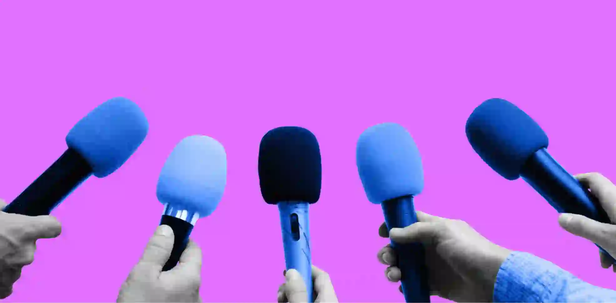 microphones in hands on purple background
