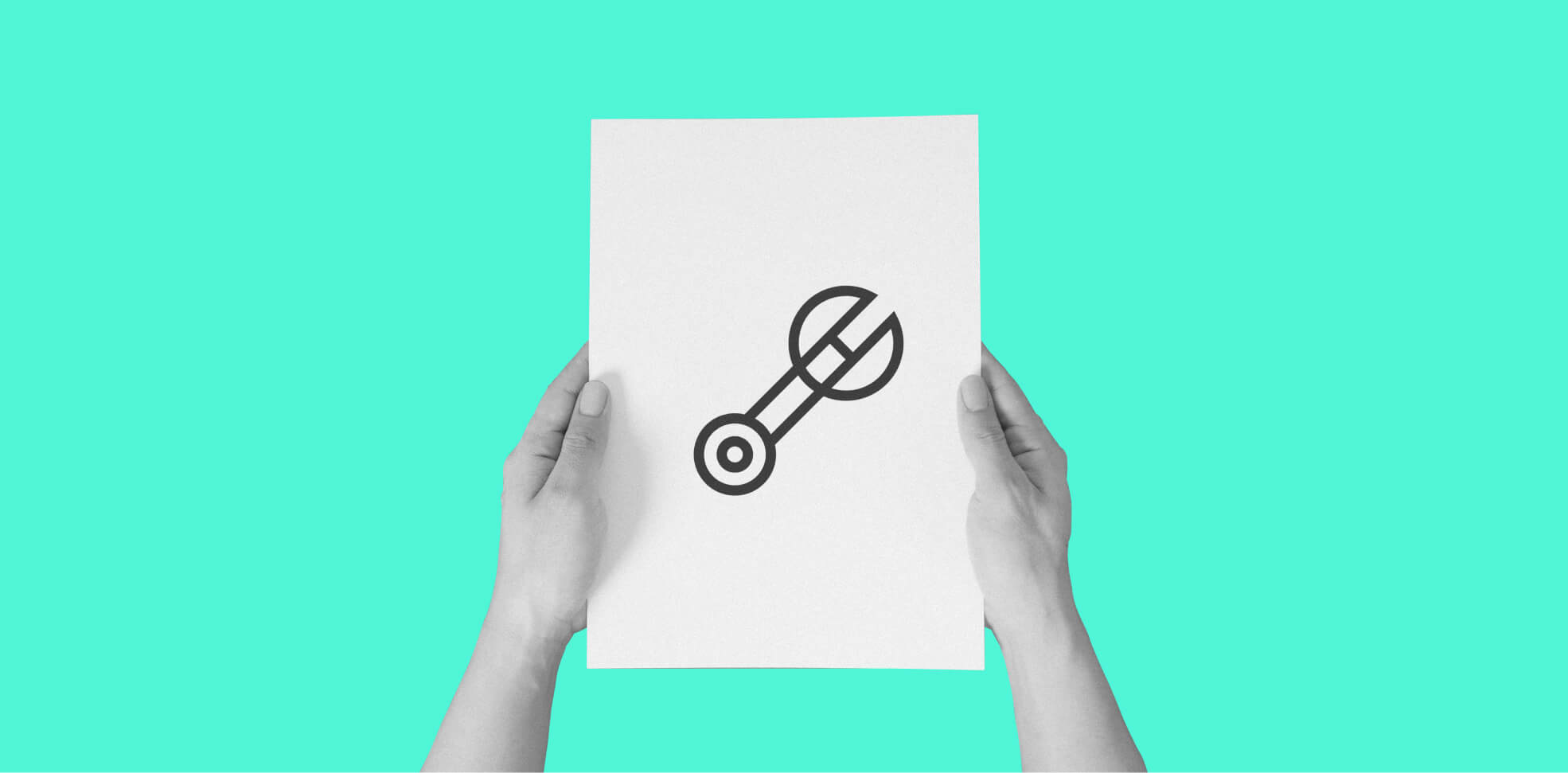 hands holding a sheet of paper with a wrench icon, on a green background