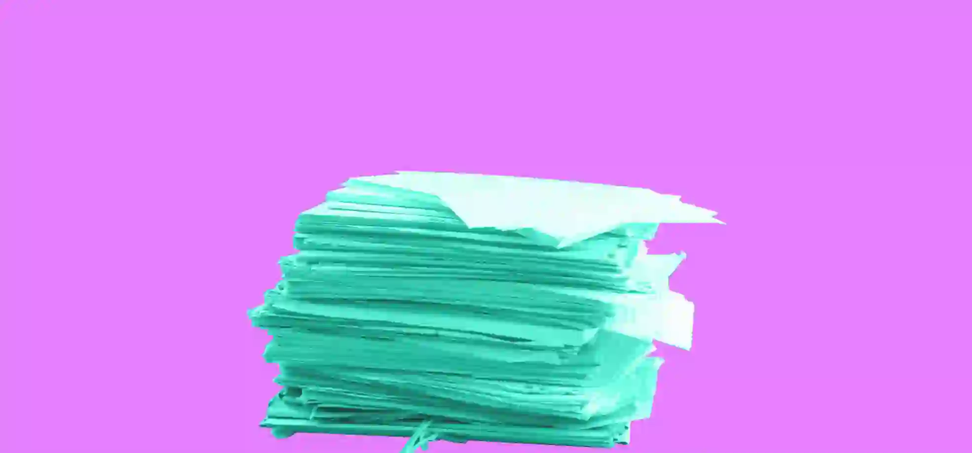 pile of papers on purple background