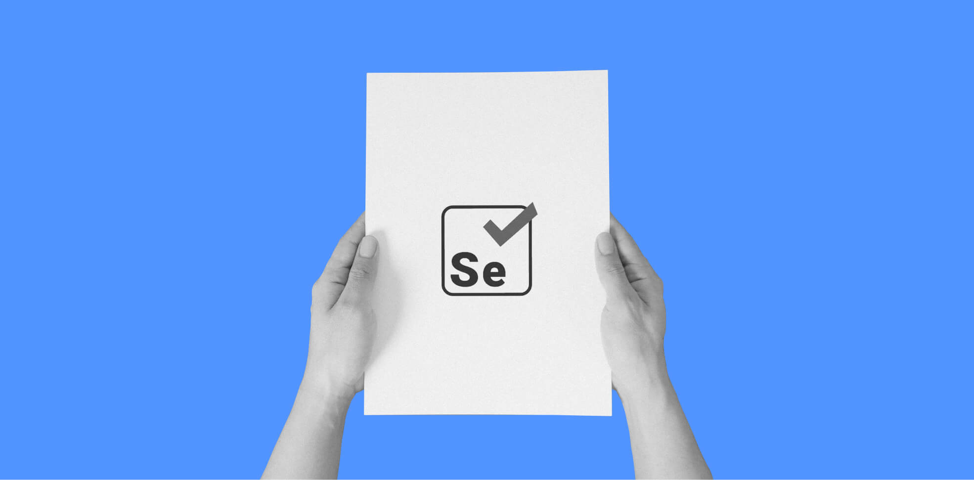 hands holding a sheet of paper with a Selenium logo