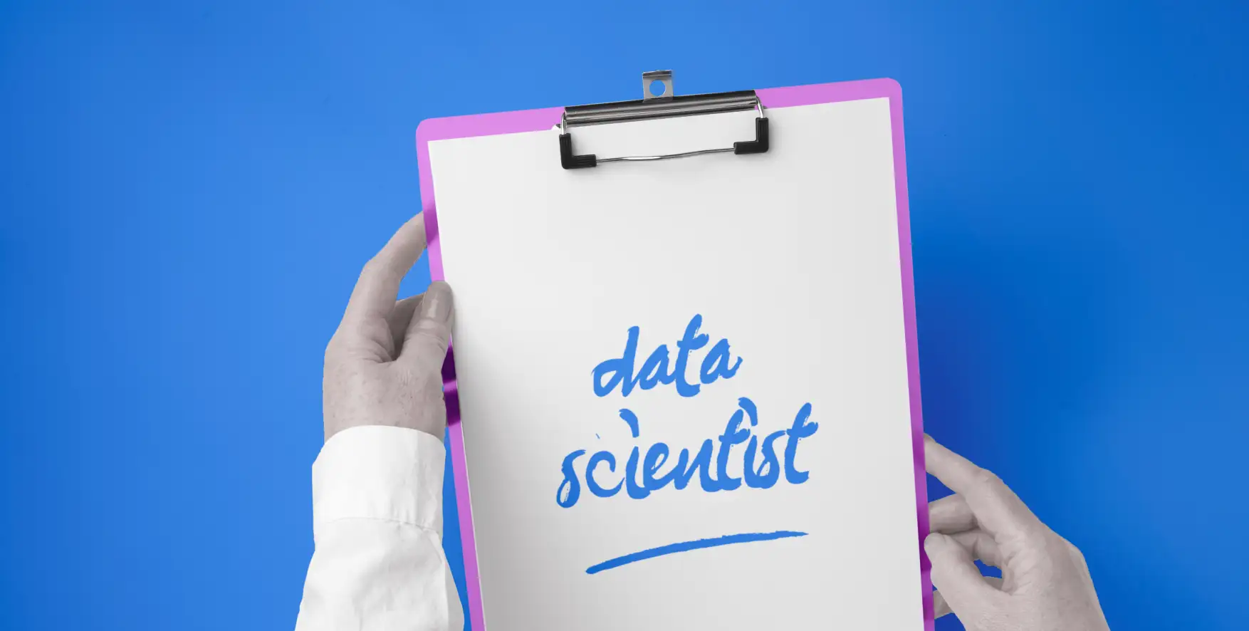 data scientist written on a piece of paper in a clipboard