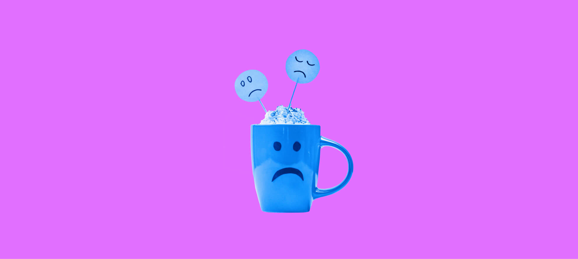 a cup with a sad smiley