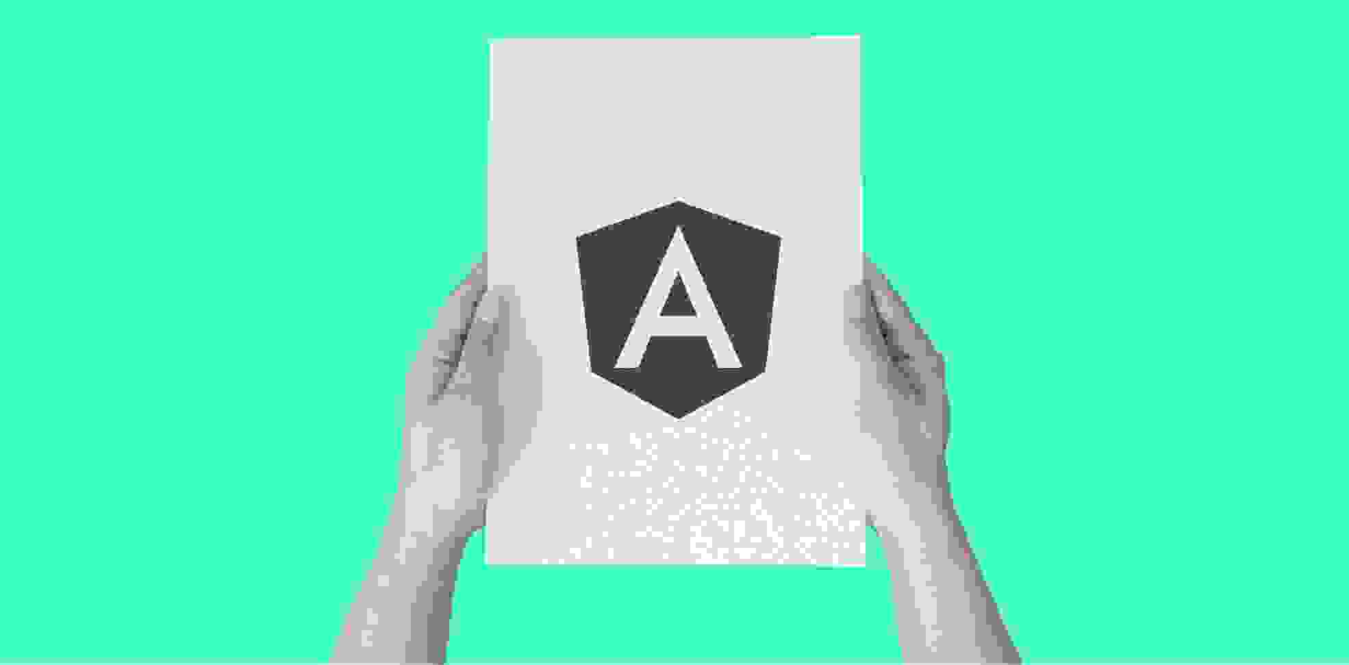hands holding a sheet of paper with an Angular logo on green background