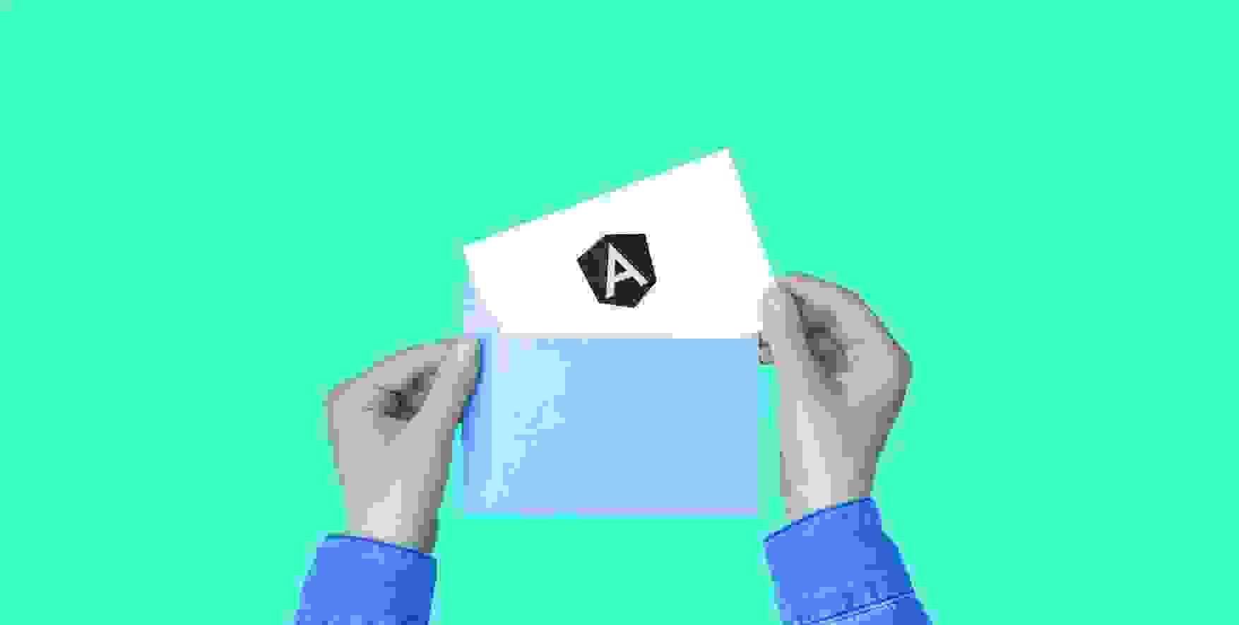 a sheet of paper with a symbol of Angular in an envelope