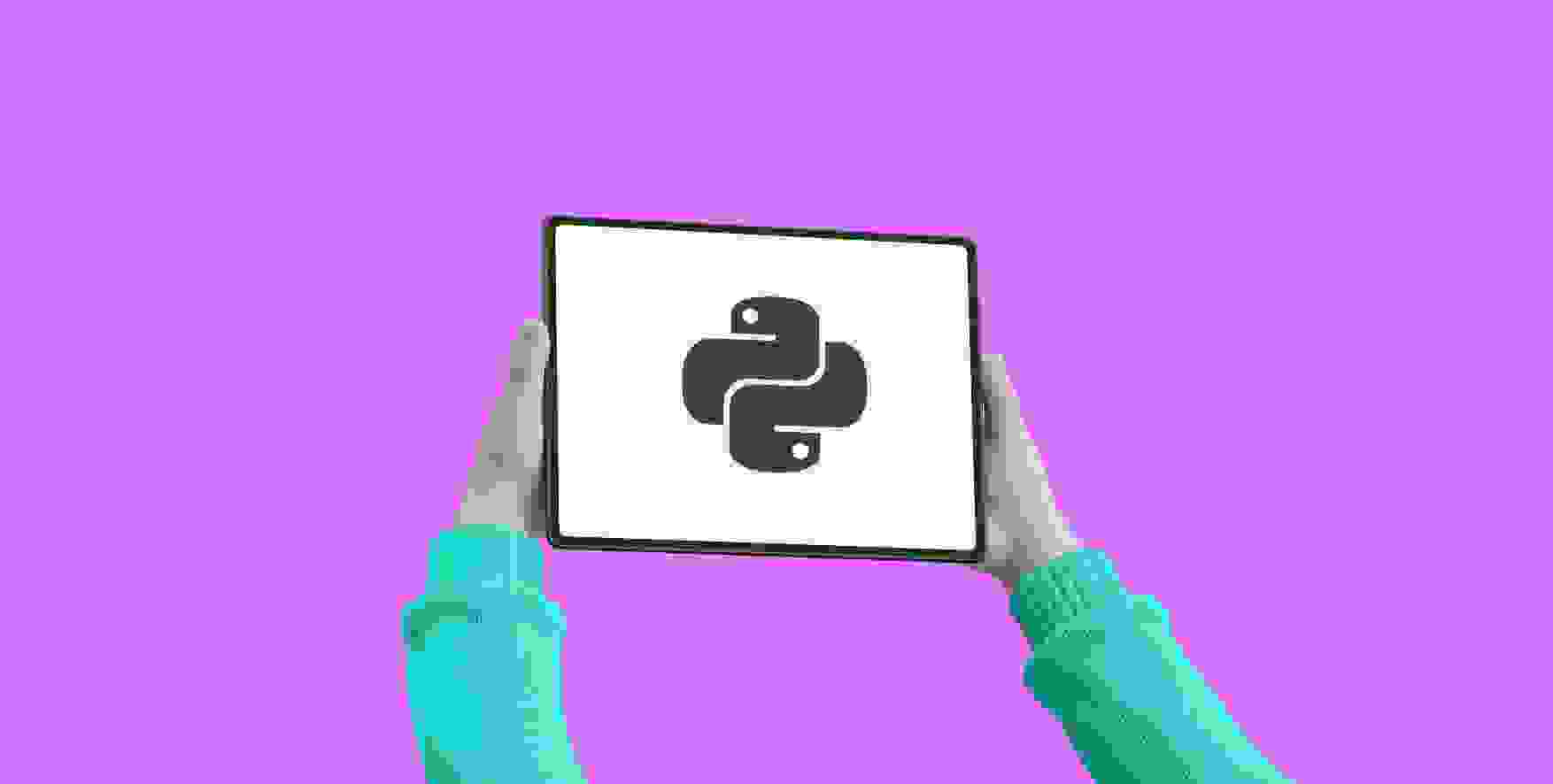 hands holding a tablet with a Python logo on the screen