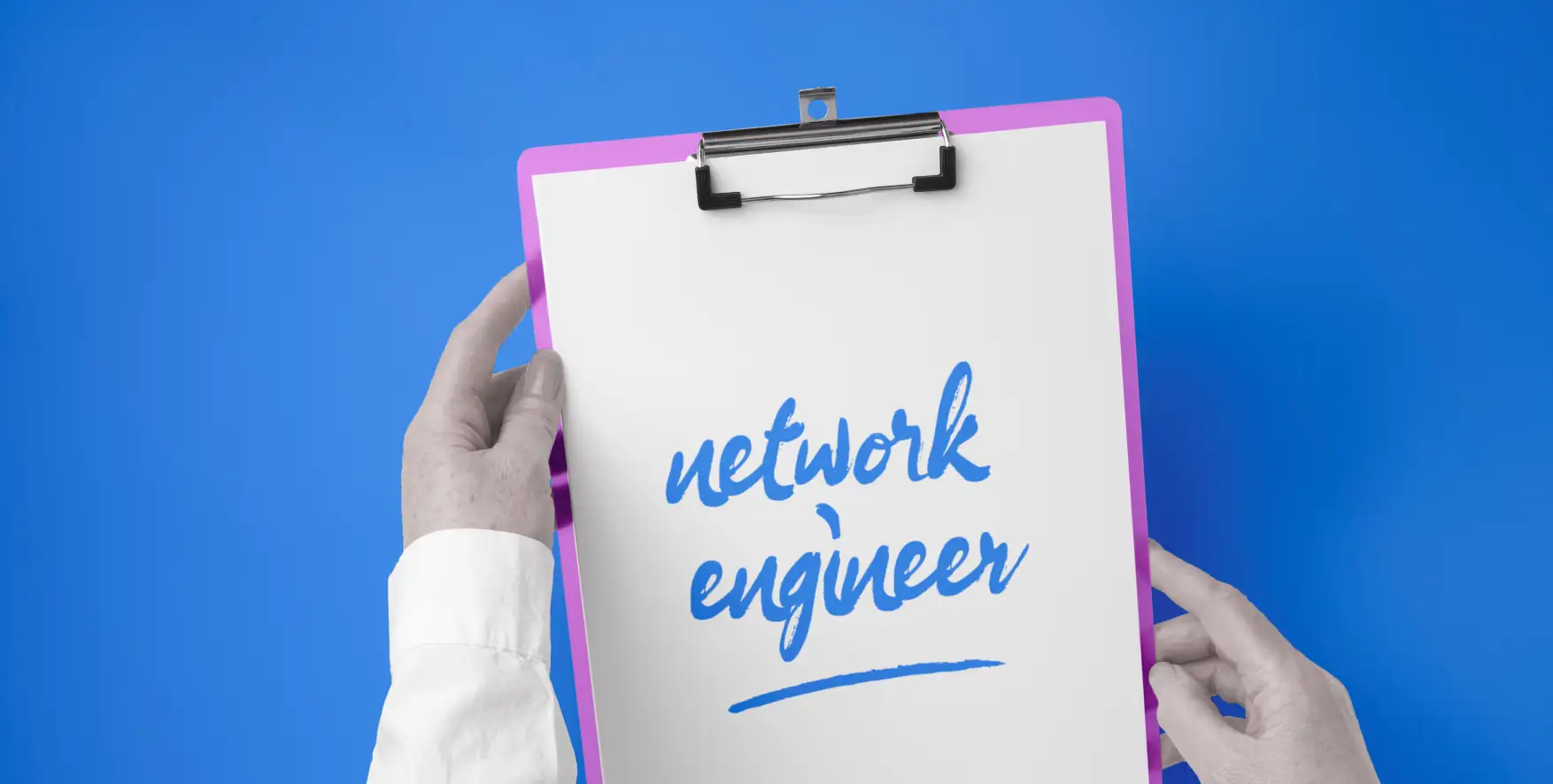 network engineer written on a piece of paper in a clipboard