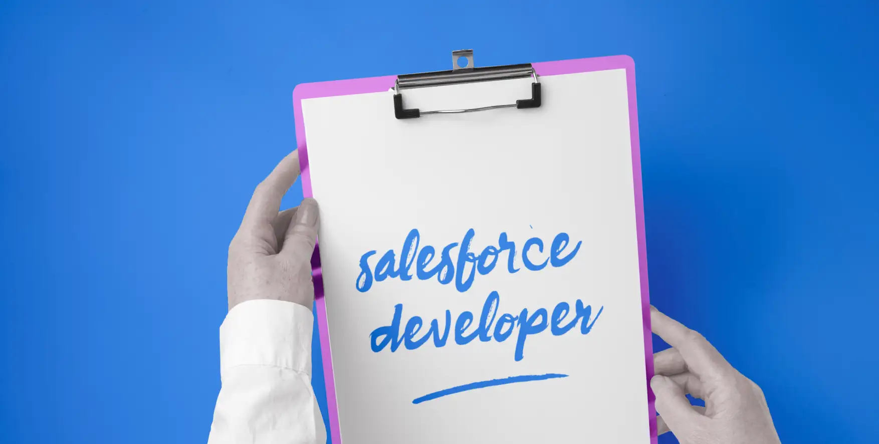 Salesforce developer written on a piece of paper in a clipboard