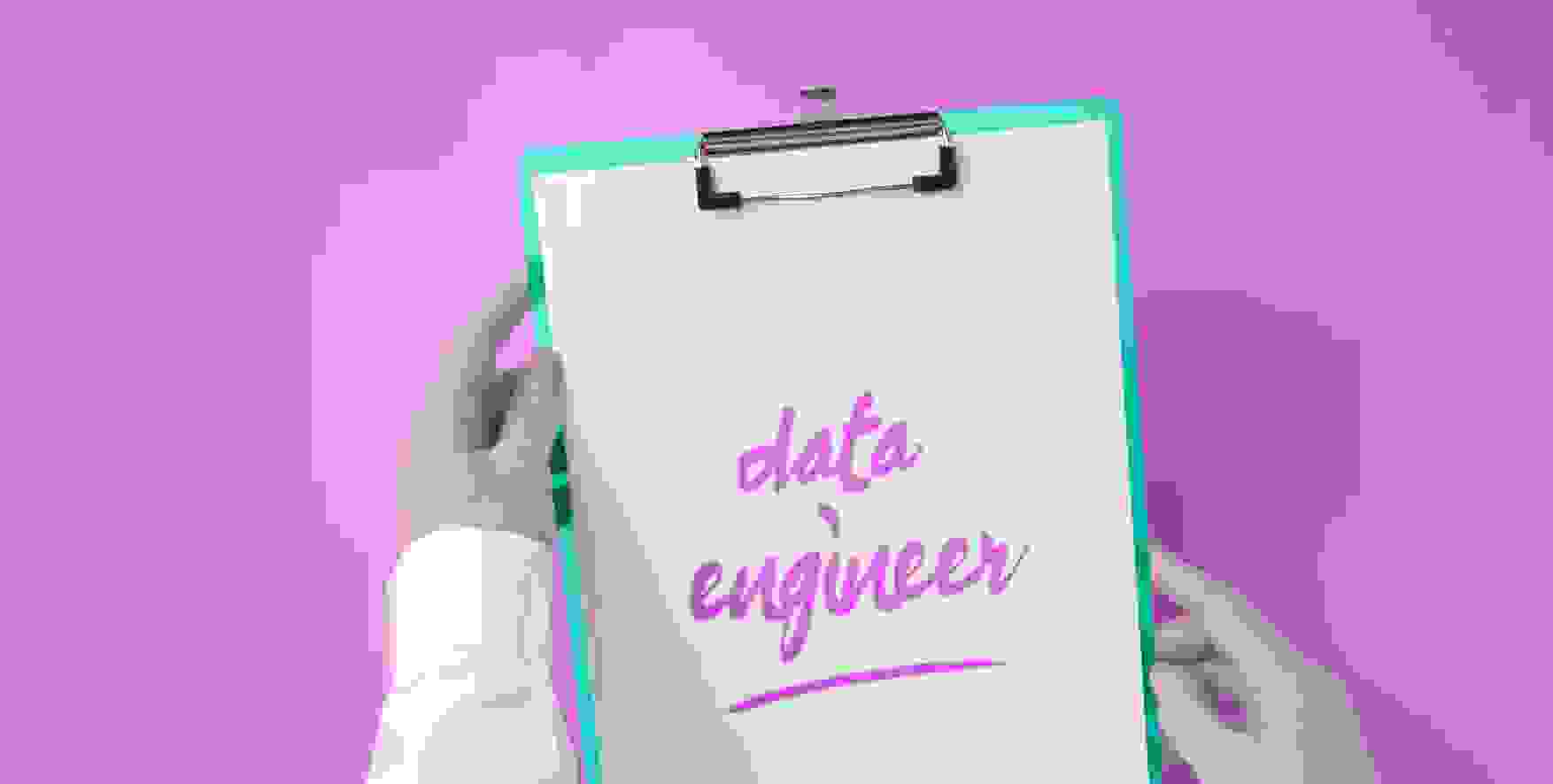 data engineer written on a piece of paper in a clipboard