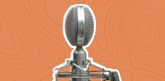 A microphone on the orange background