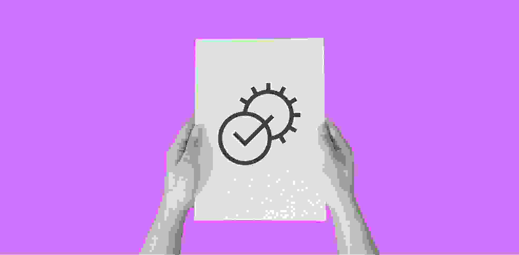 hands holding a sheet of paper with a symbol of checkbox on purple background