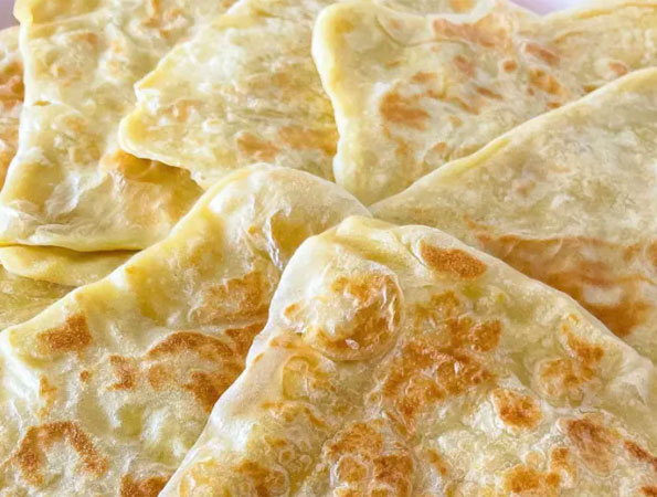 Moroccan Mesmen Semolina Pancakes by Shelina Permalloo