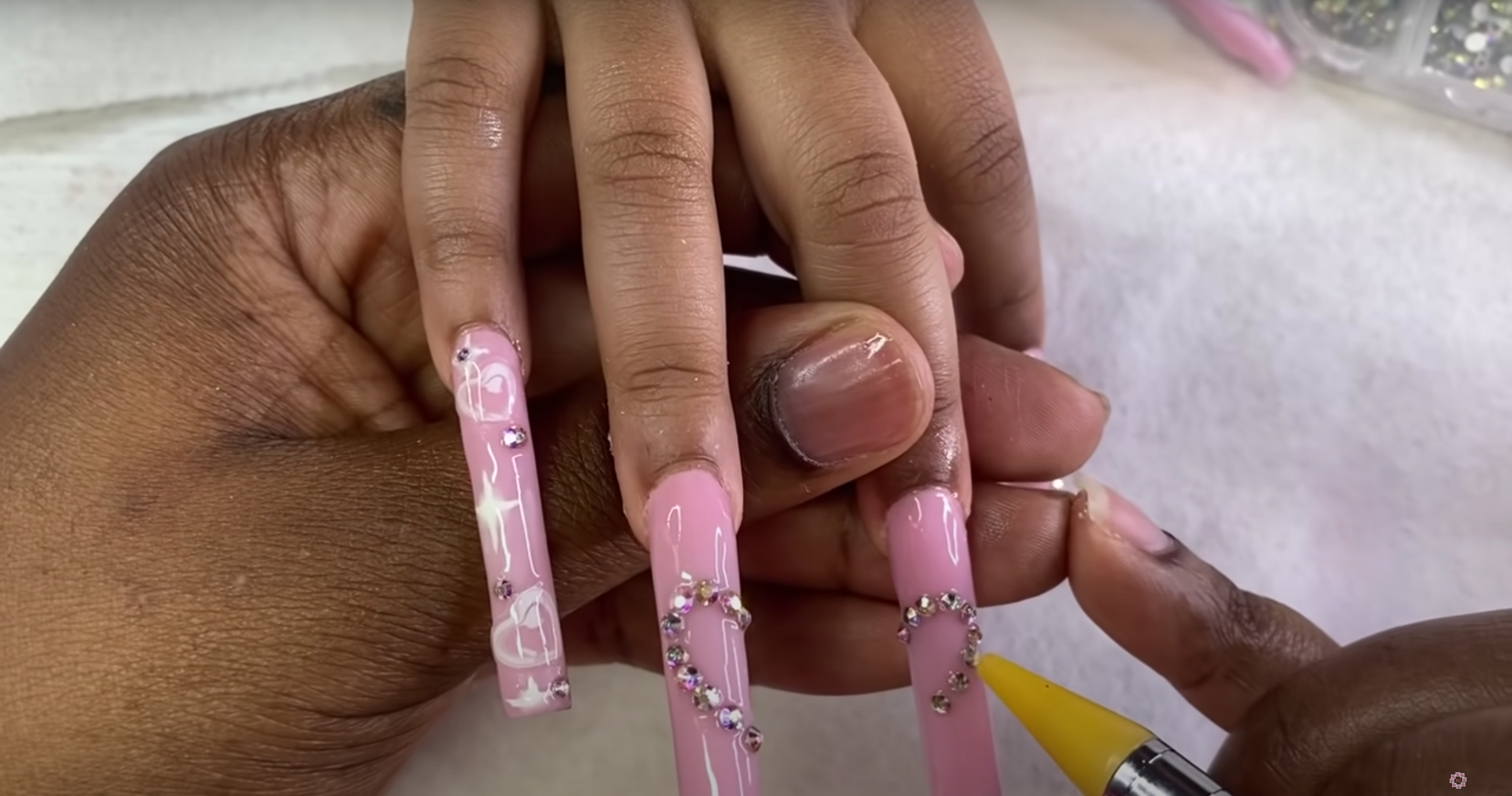 Mom Defends 10-Year-Old Daughter's Acrylic Nails Despite Painful