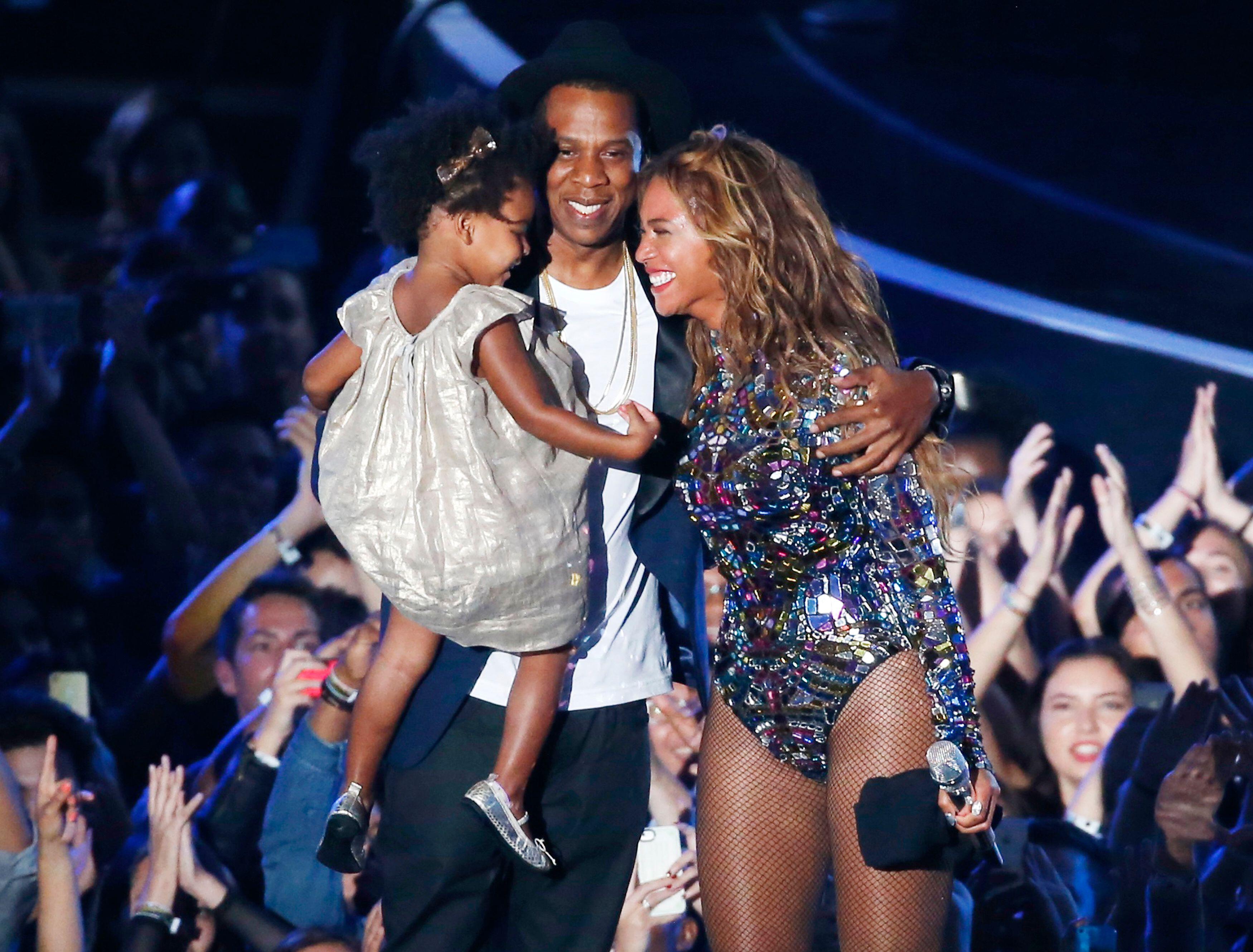 Blue Ivy is adorably embarrassed by Jay-Z's hug, kiss at NBA Finals
