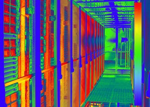 Thermal image with a thermal imaging camera from a cold aisle with server racks in a data center.