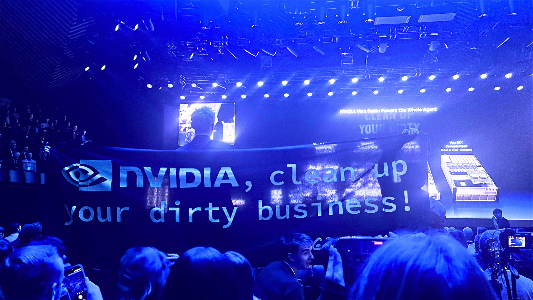 Protesters holding up a banner that read,