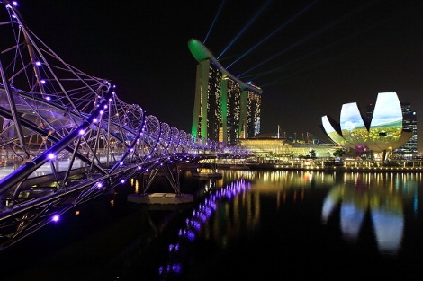 A view of the Helix Bridge, Marina Bay Sands, ArtScience Museum and the city skyline in Singapore.