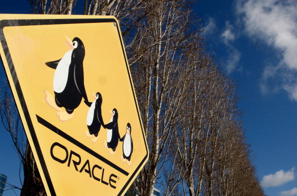 A sign with Linux penguins is seen in front of the Oracle headquarters in Redwood Shores, California, seen in 2007.