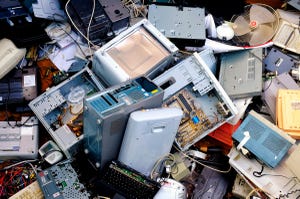pile of discarded electronic devices