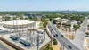 an aerial view of an Austin Energy-owned electrical substation next to the North Austin reservoir. an aerial view of an Austin Energy-owned electrical substation next to the North Austin reservoir.