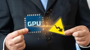 a person holding a GPU chip and a winding road sign a person holding a GPU chip and a winding road sign
