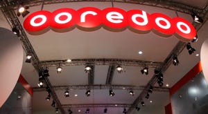 Image of the logo of the firm OOredoo with white letters outlined in red.