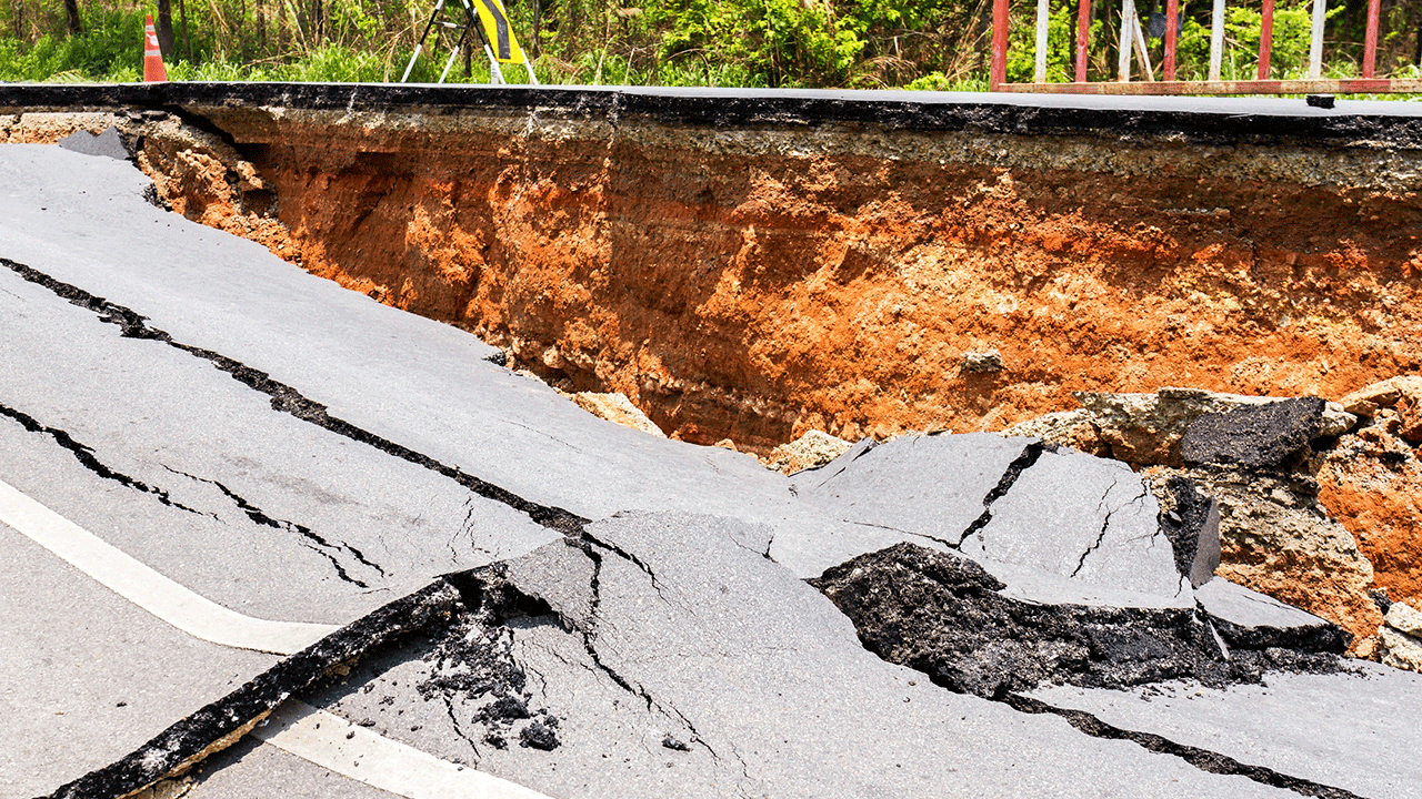 Broken road and ditch