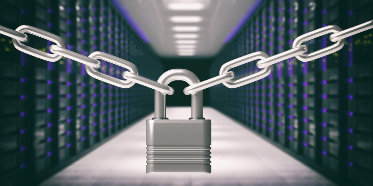 Padlock locked and chains against data center background Padlock locked and chains against data center background