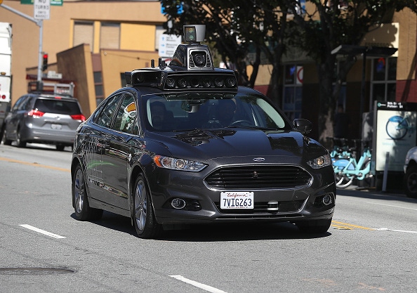 An Uber self-driving car drives down 5th Street in March 2017 in San Francisco.