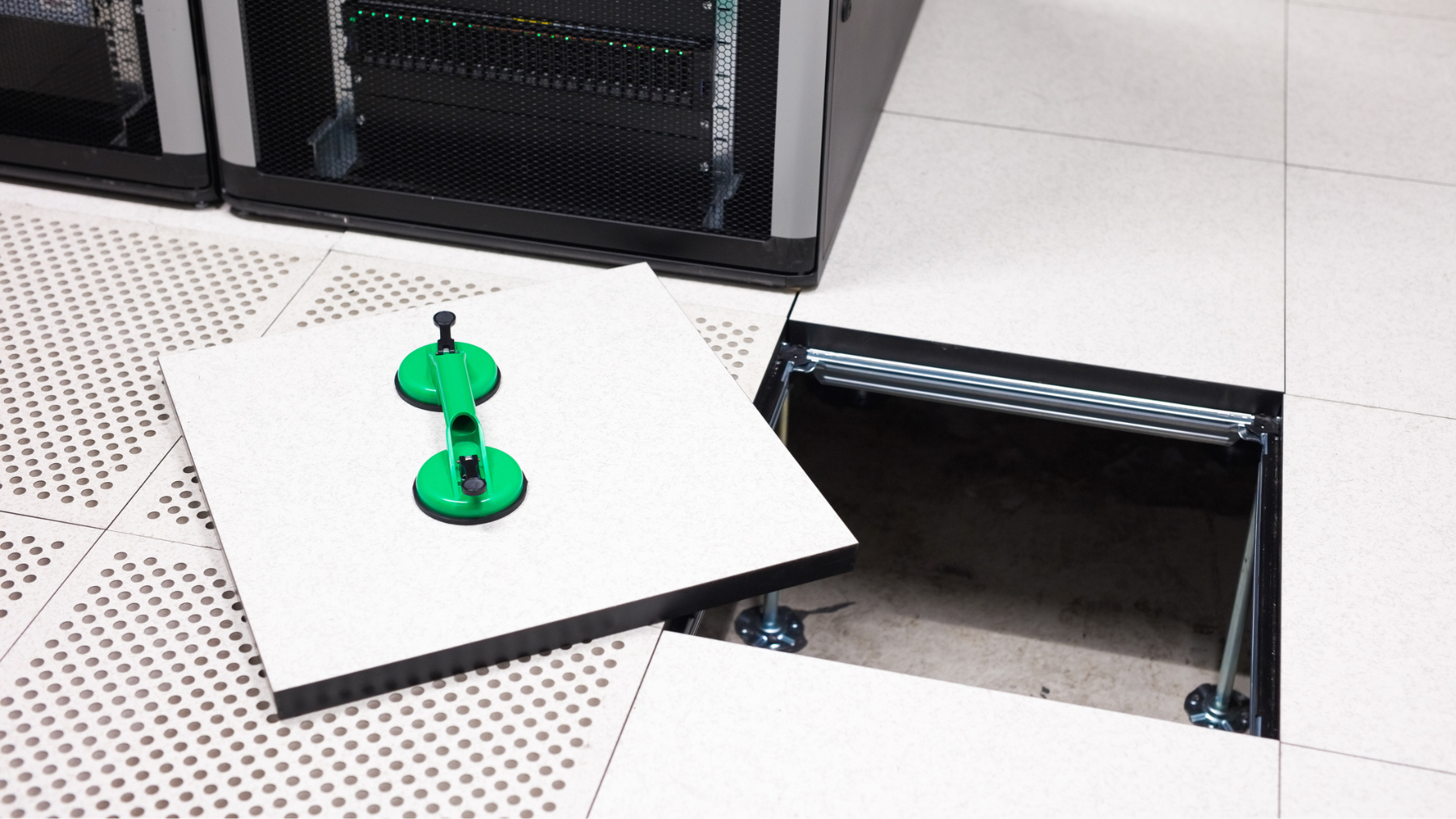 Lifted Floor Tile With Vacuum Suction Cups In Data Center