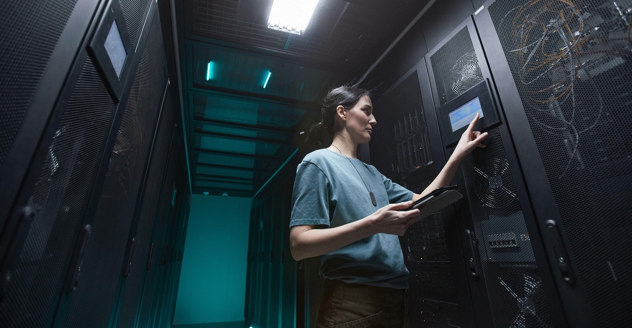 woman working in a data center woman working in a data center