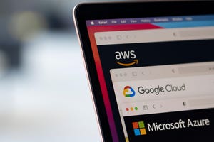 AWS, Google Cloud, and Microsoft Azure logos are seen respectively on the websites of the big three cloud providers on a laptop computer.
