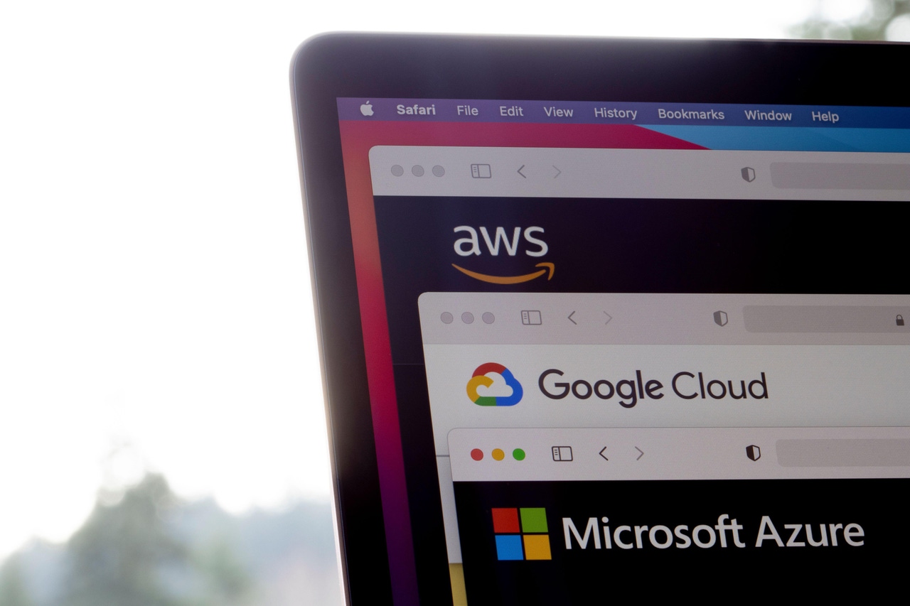 AWS, Google Cloud, and Microsoft Azure logos are seen respectively on the websites of the big three cloud providers on a laptop computer. AWS, Google Cloud, and Microsoft Azure logos are seen respectively on the websites of the big three cloud providers on a laptop computer.