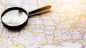 Magnifying glass on a map of the United States