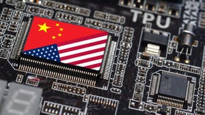 China and US flag on a printer circuit board China and US flag on a printer circuit board