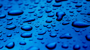 Water droplets in blue Water droplets in blue