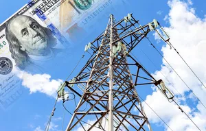upward facing view of a electricity pole and a large $100 bill upward facing view of a electricity pole and a large $100 bill