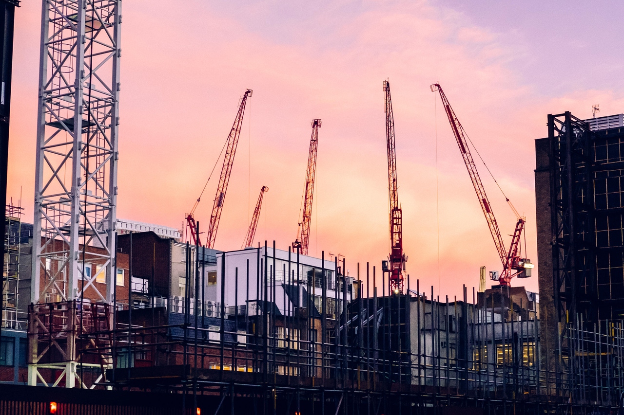 Evening cranes over a data center construction site Evening cranes over a data center construction site
