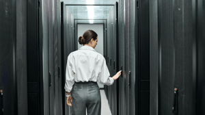 professional working in a data center professional working in a data center