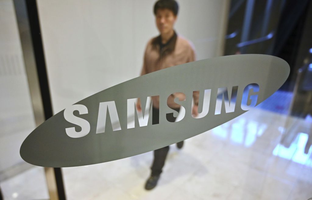 Samsung logo at the company's showroom in Seoul Samsung logo at the company's showroom in Seoul