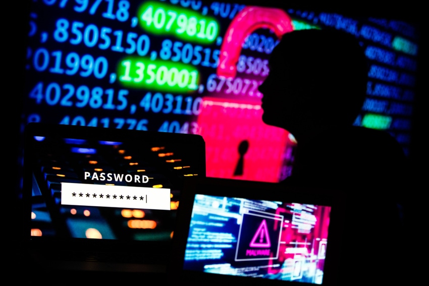 silhouette in a dark room with cybersecurity incident