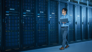 IT Engineer Working with Server Racks IT Engineer Working with Server Racks