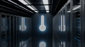 Illuminated thermometer symbol in a modern data center Illuminated thermometer symbol in a modern data center