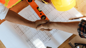 top view construction worker team contractor hand shake top view construction worker team contractor hand shake