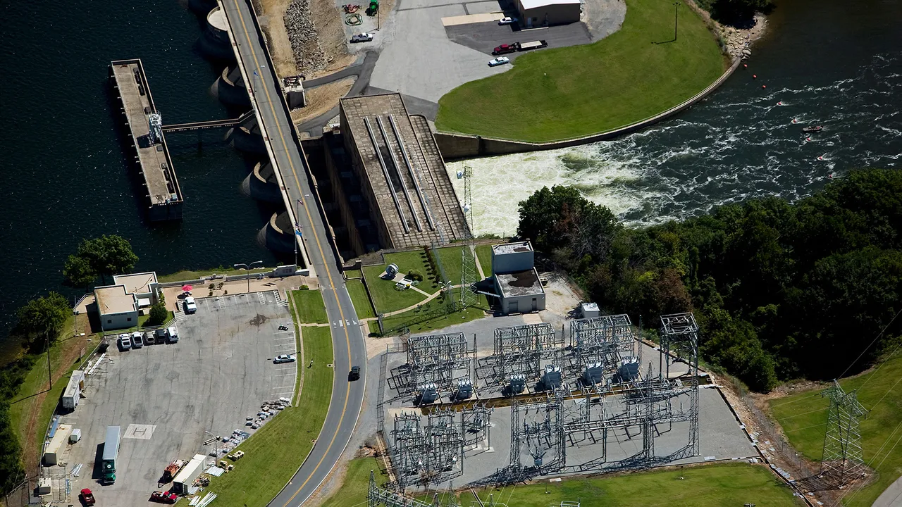 Aerial view above Pensacola Dam hydroelectric generating station in Grand River Oklahoma Aerial view above Pensacola Dam hydroelectric generating station in Grand River Oklahoma