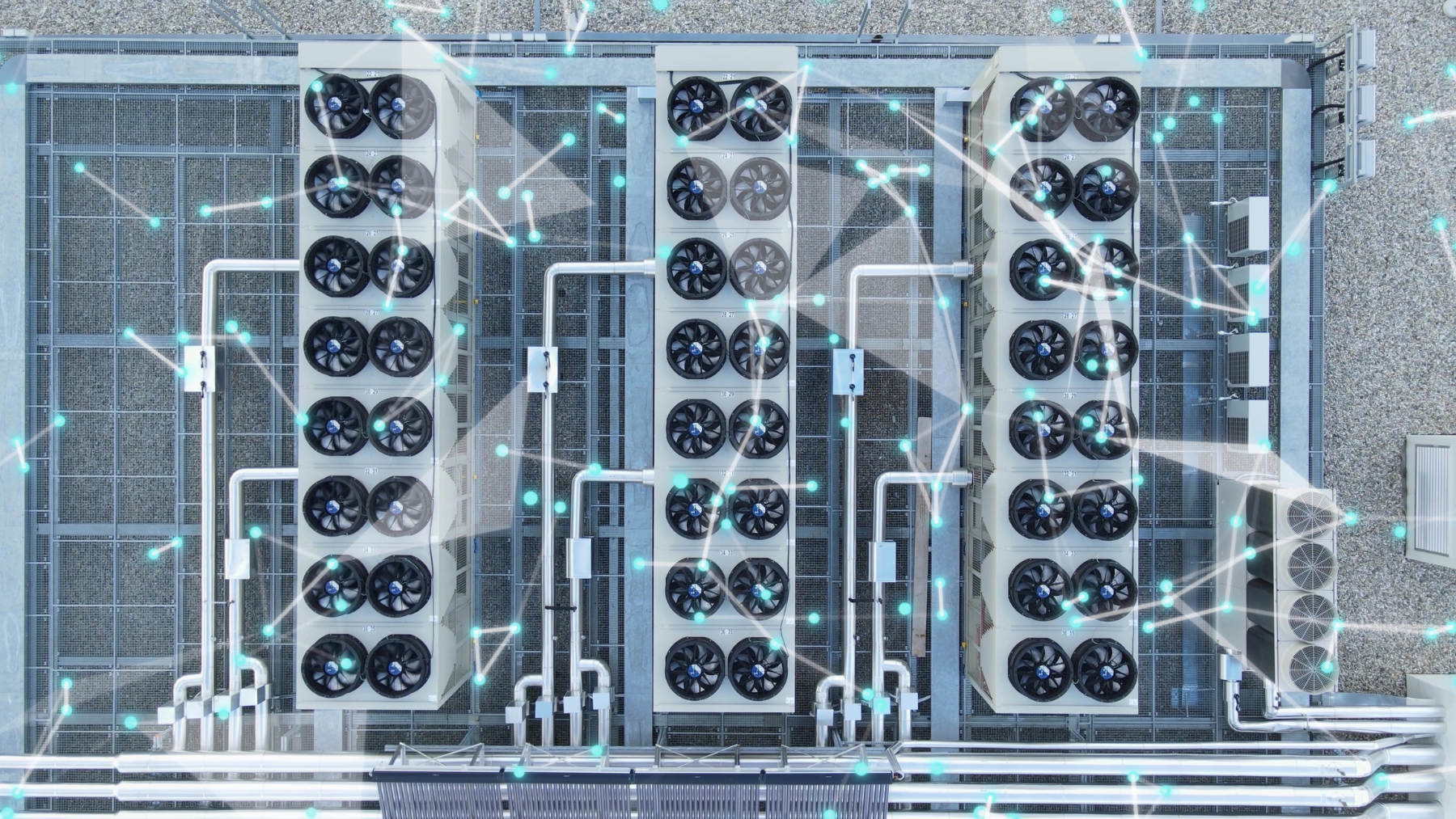 data center rooftop with ventilators and digital graphics overlay representing connective links