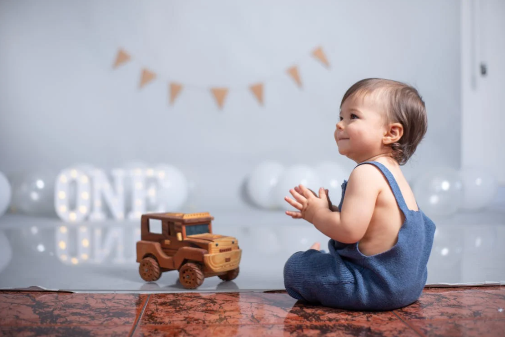 Sitting Child Celebrating Birthday